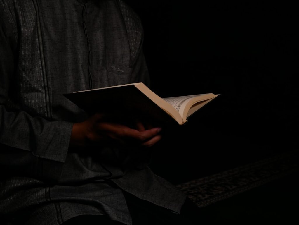 A student reading the Quran